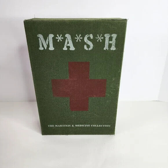 A sealed M*A*S*H DVD Martinis and Medicine Collection with  T-shirt & Dog Tags
