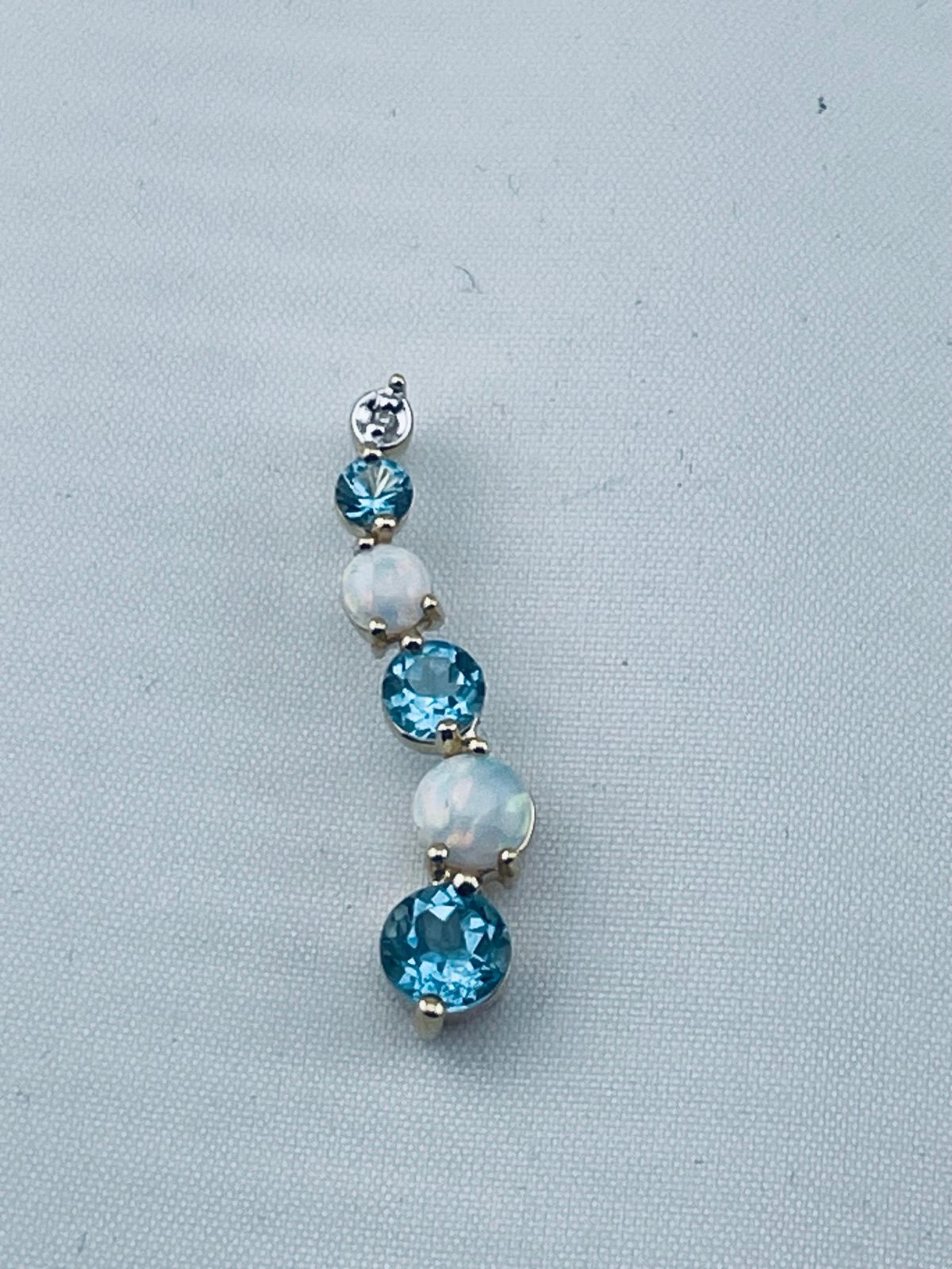 Vintage topaz, opal and diamond journey, pendant, 14 karat yellow gold