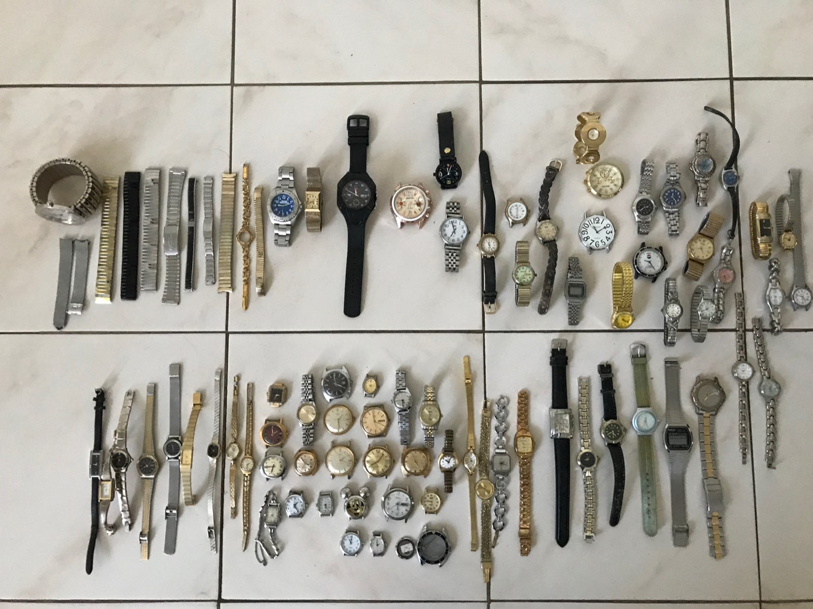 Large lot of watches for repair