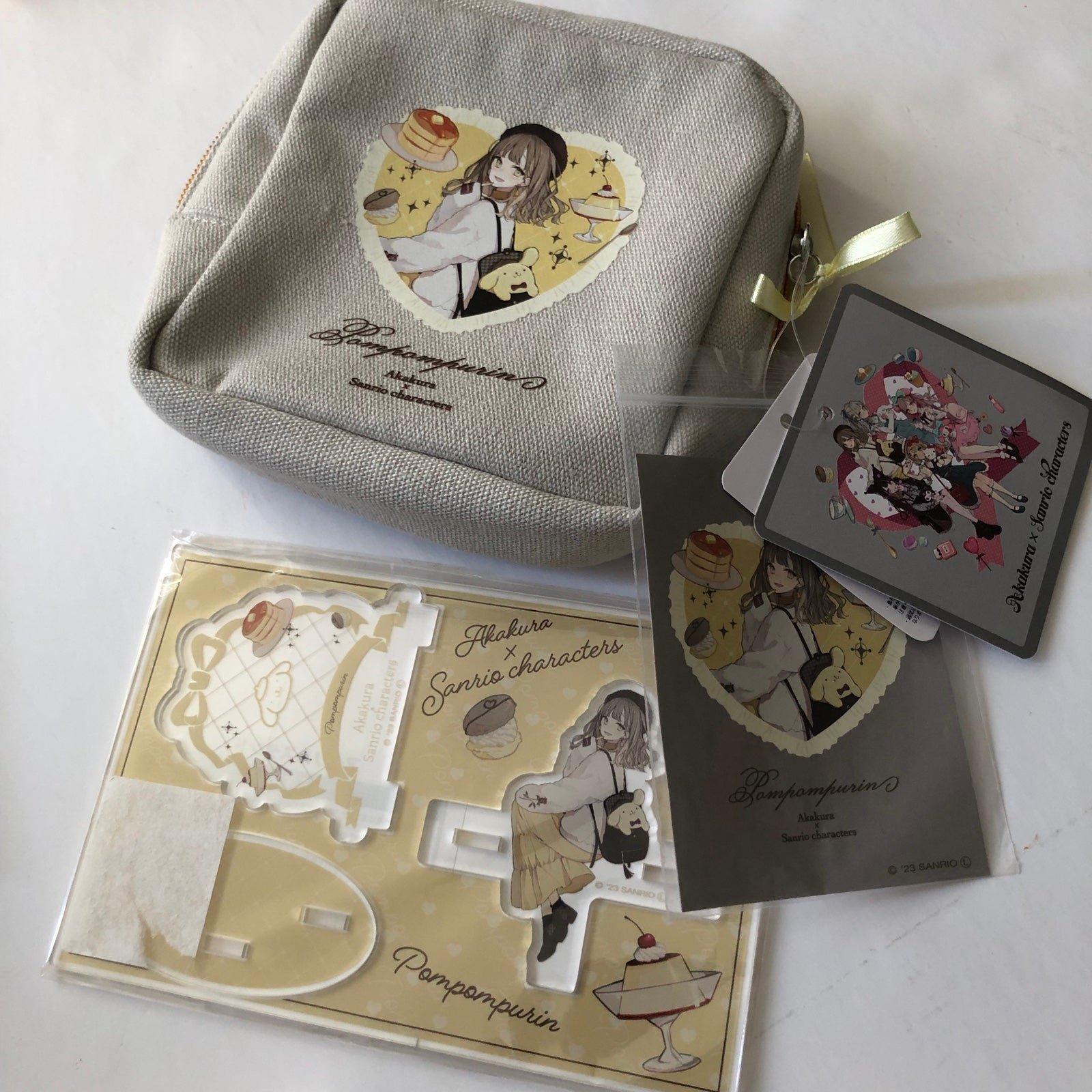 Pompompurin Bag Pouch and Acrylic Stand Akakura x Sanrio Characters Collab Merch