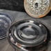 Black and blue enamelware lids