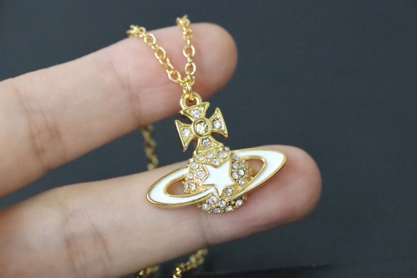 Vivienne Gold Rim white enamel Meteor Saturn necklace