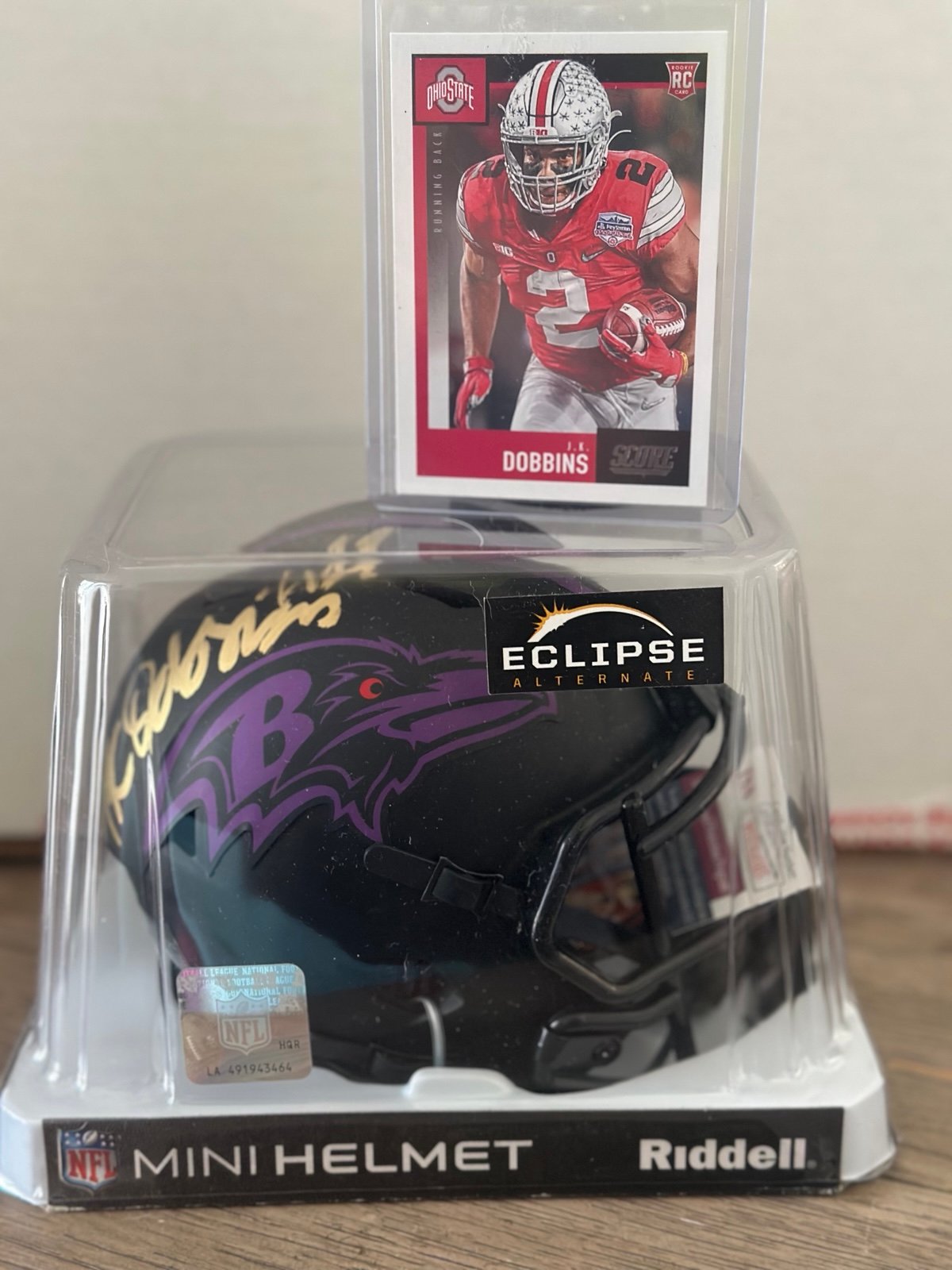 Baltimore Ravens Mini Helmet Autographed by JK Dobbins with a rookie card.