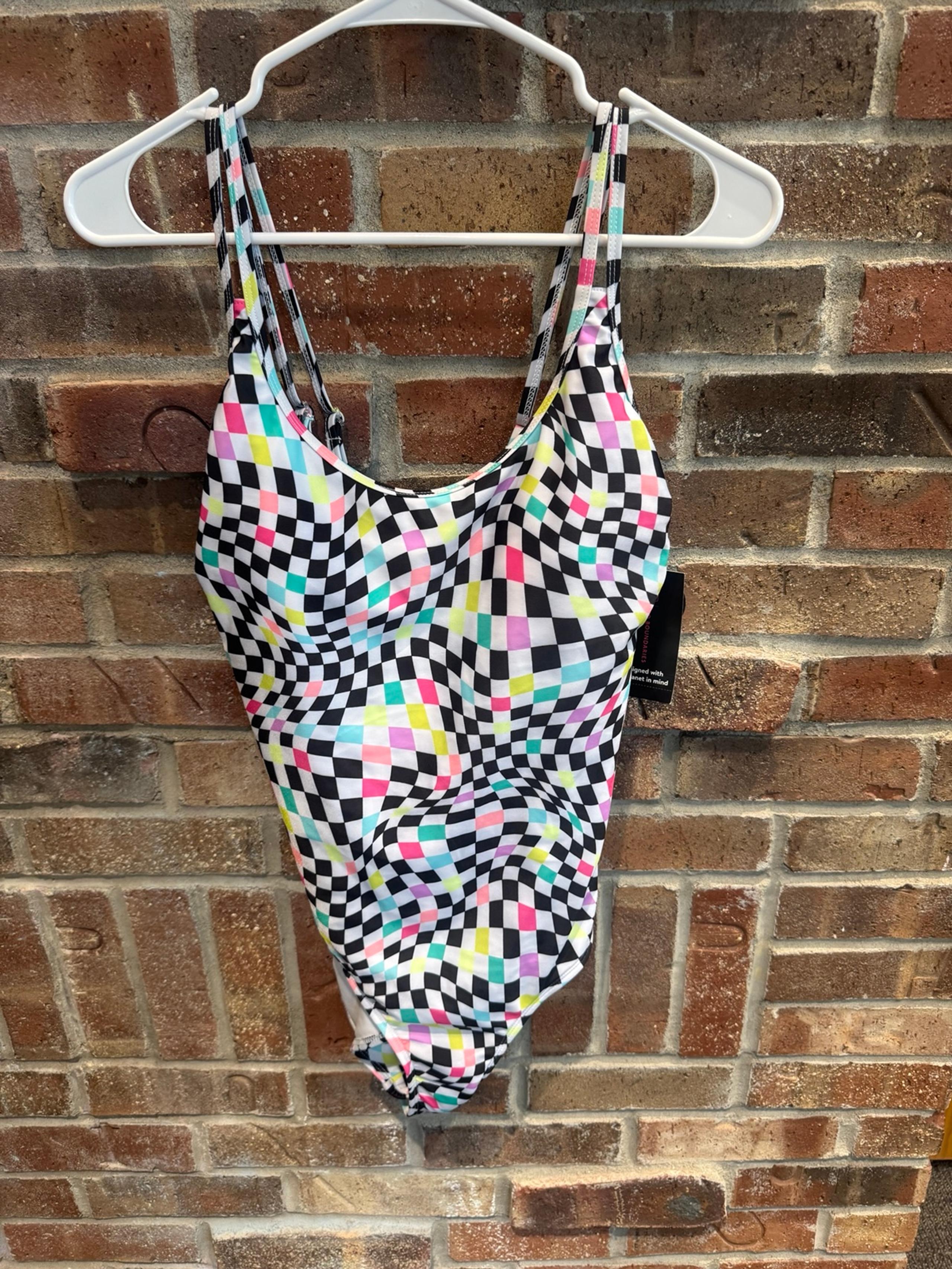 No Boundaries high leg one piece bathing suit.