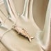 Vintage silver articulated fish pendant necklace