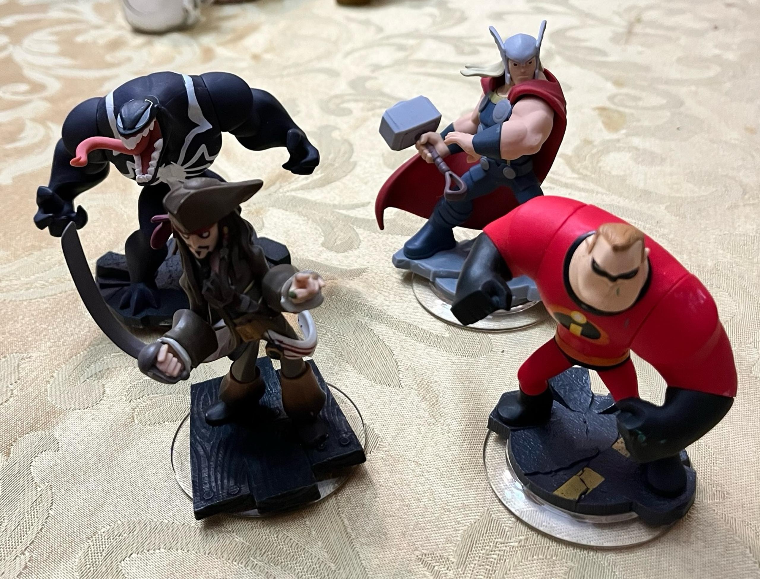 Disney Infinity Bundle of 4 Figures. Marvel Thor, Venom & more.