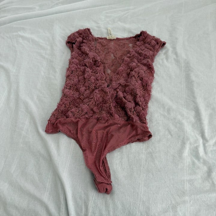 free people bodysuit Size medium Condition: NWOT Color: pink