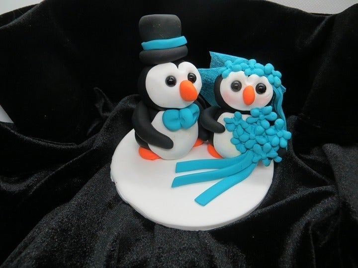 Teal bride and groom penguin / wedding anniversary cake topper