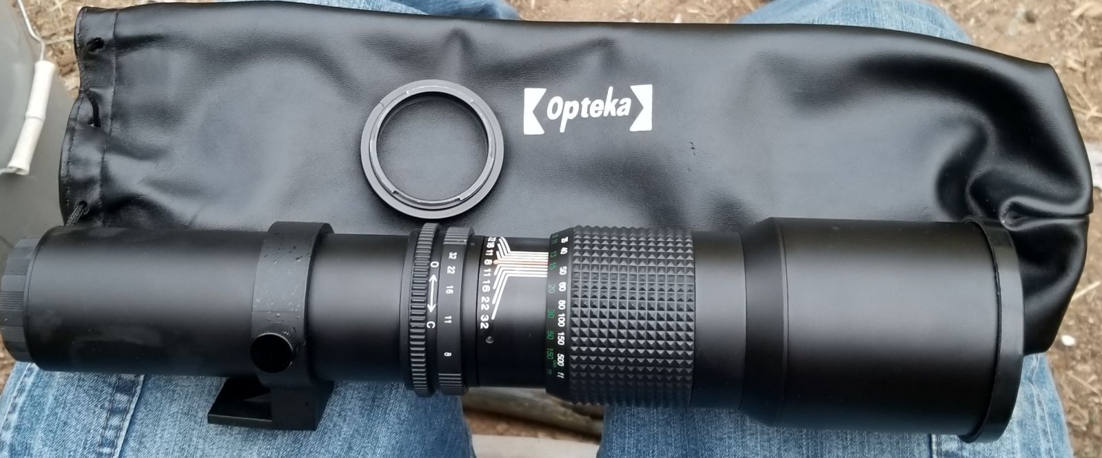 OPTEKA wide angle lens in very good condition. Comes in a leather pouch
