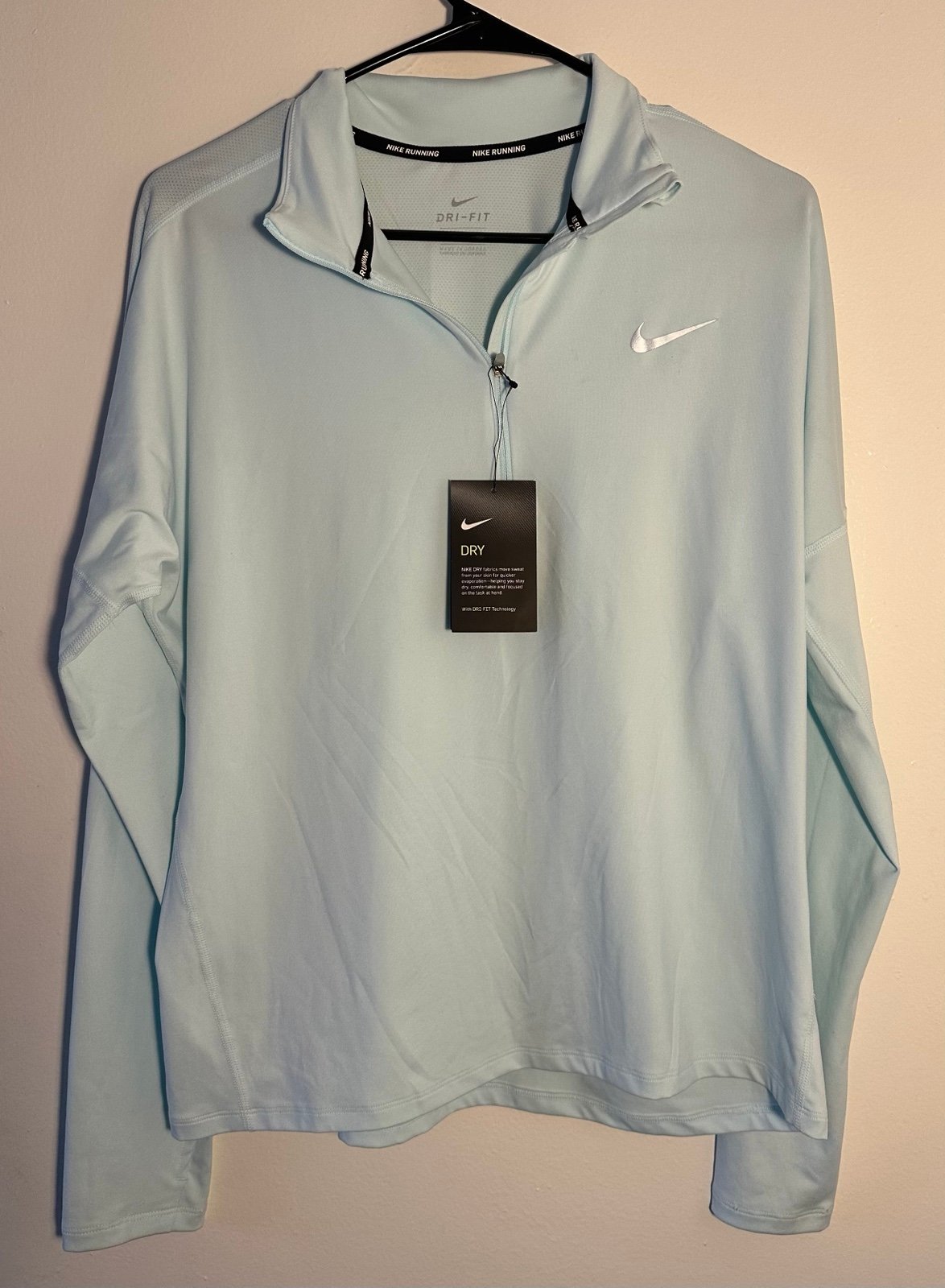 Nike women’s blue quarter zip long sleeve shirt Large NWT