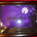 sz13x11 FRAMED PURPLE HALLOWEEN WITCH WELCOME PHOTO SIGN IN VINTAGE HQ LD 2270