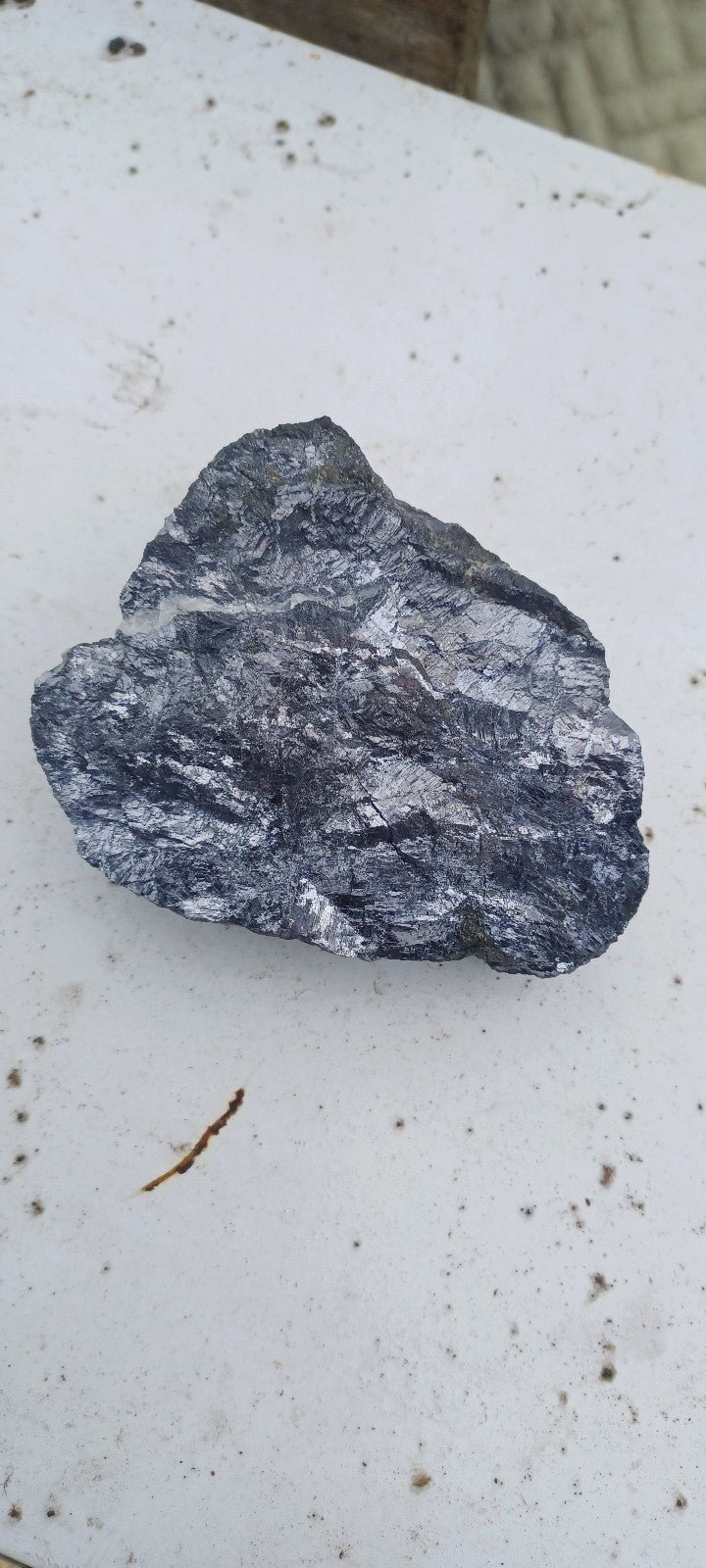 extremely heavy shiny rock maybe silver