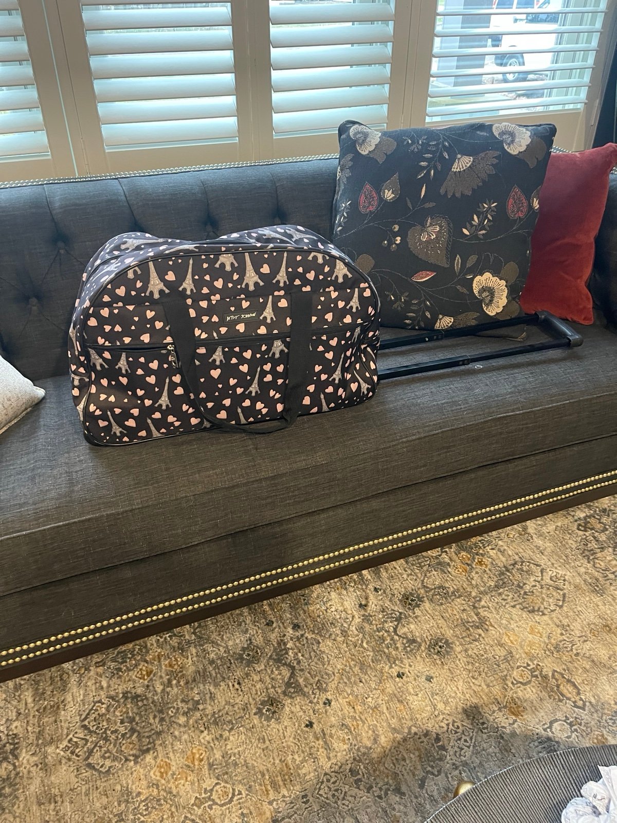 Betsy Johnson rolling duffel bag with trolley