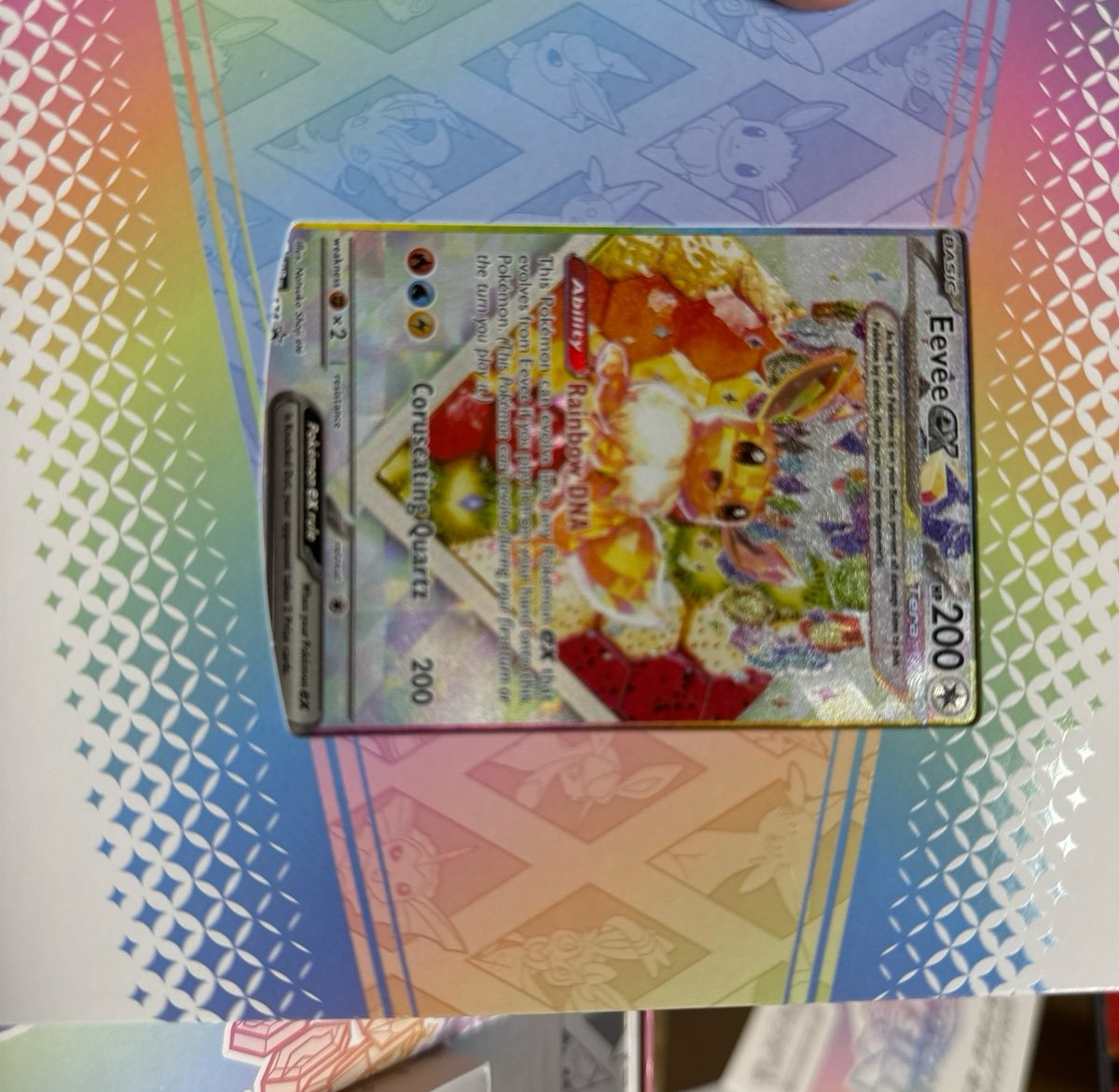 Pokemon Eevee Ex Promo Card Prismatic Evolutions with holder and codes