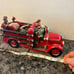 Vintage Vannark Red Hats of courage Fire Engine bookends from 1998