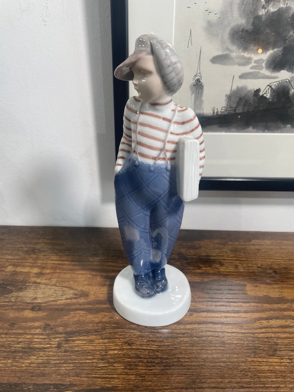 Royal Copenhagen highly collectible figurine “Holding the newspaper”