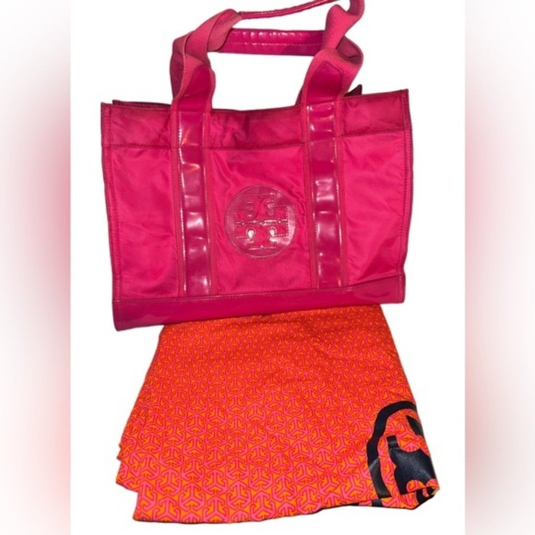 Tory Burch tote has a black ink mark which can be seen in video and pics