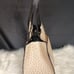 Unique Black/Creme Mondani Purse
