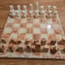 Hand carved Mexican Aztec Onyx/Marble Red and White 32 piece 17 chess board