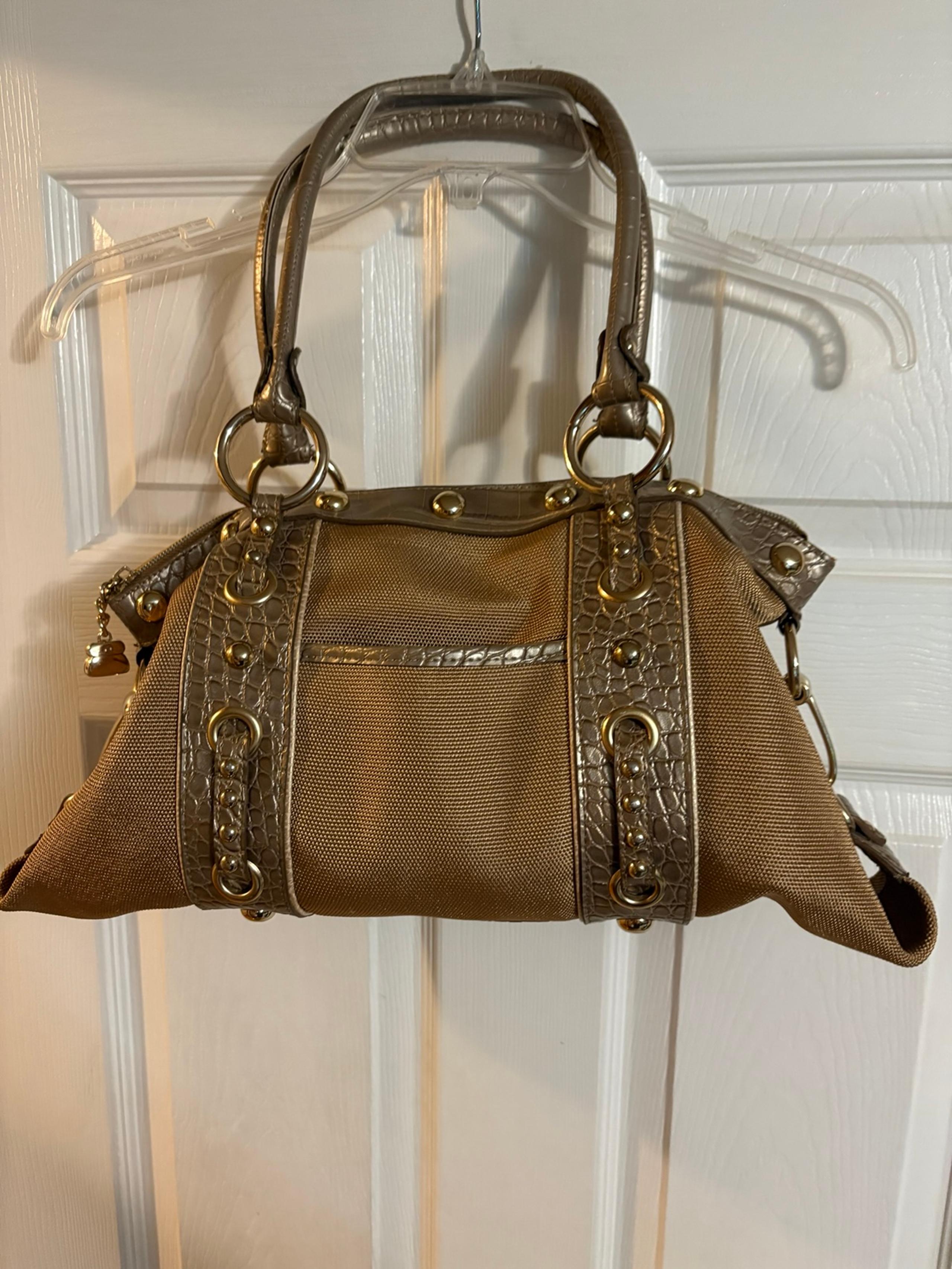 Beautiful like new Kathy Van Zeeland gold purse