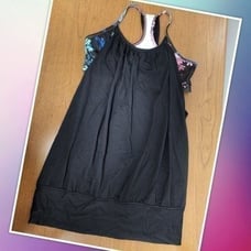NWOT Lululemon tank top with attached sports bra size 6. Black raserback tank to