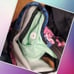 NWOT Lululemon tank top with attached sports bra size 6. Black raserback tank to