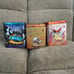 Dark, fighting, and fire type Stackable Pokemon tins (empty)