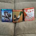 Dark, fighting, and fire type Stackable Pokemon tins (empty)