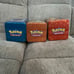 Dark, fighting, and fire type Stackable Pokemon tins (empty)