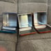 Dark, fighting, and fire type Stackable Pokemon tins (empty)