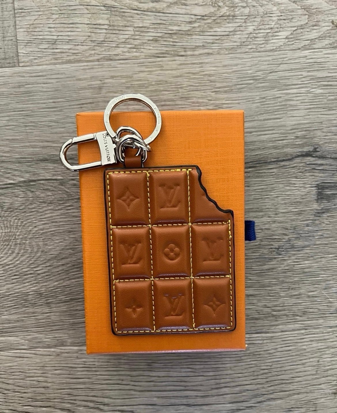 Brand new‼️will ship quick.LV cute chocolate keychain. (Box and receipt)