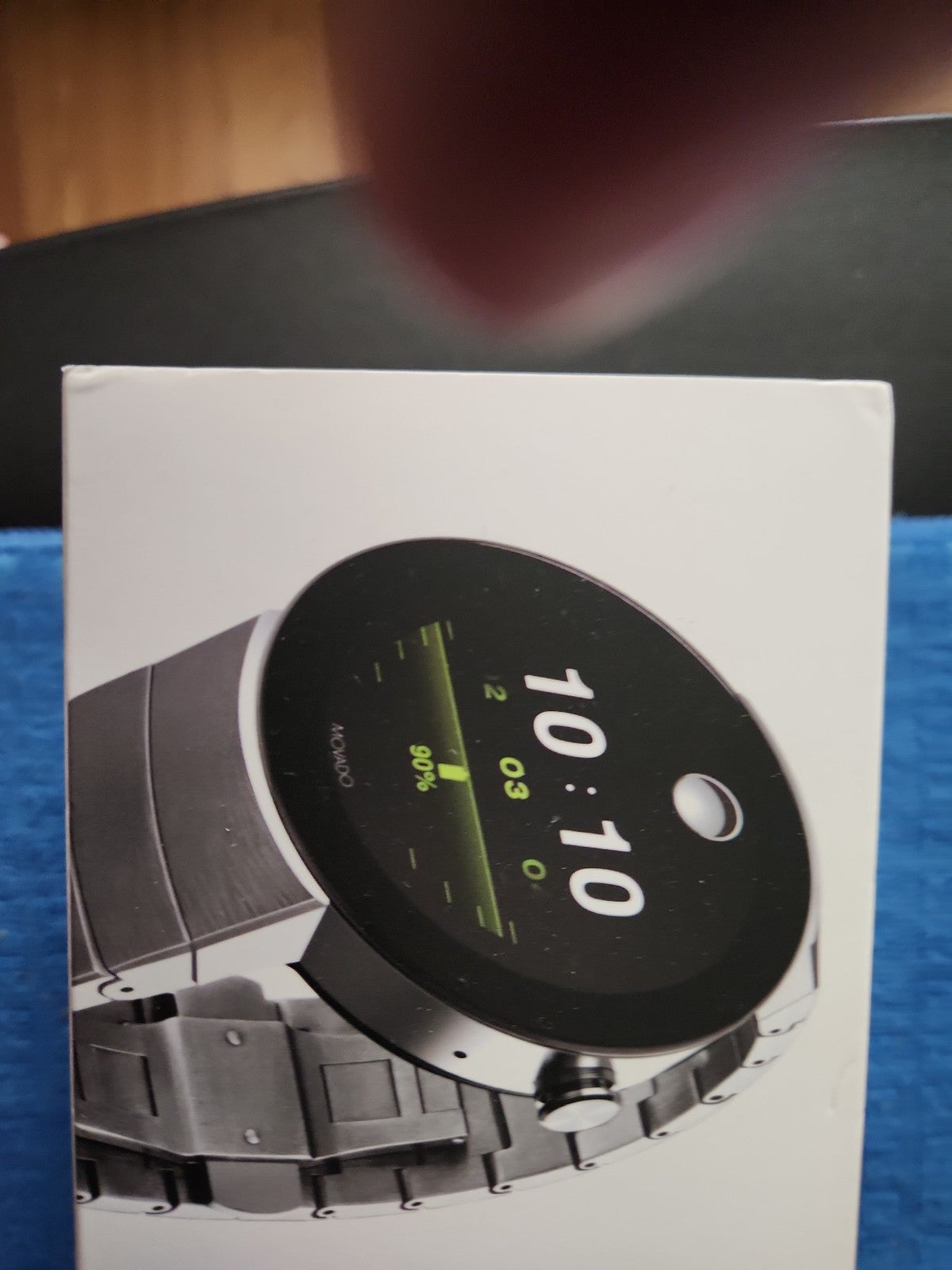 Movado Connect Men's Watch , with charger and box. Also it has many diff.faces.