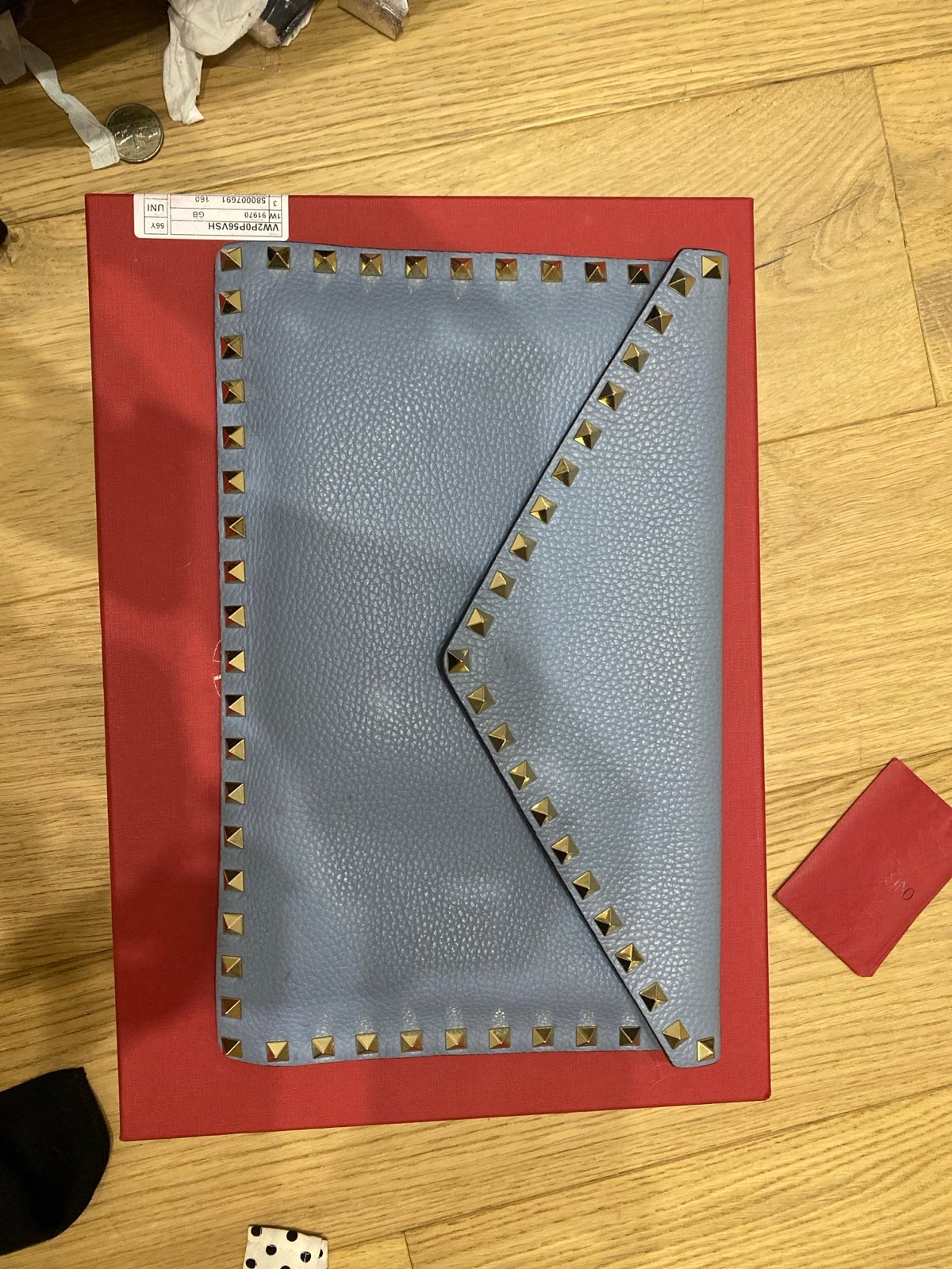 Valentino rock stud clutch in grey/blue