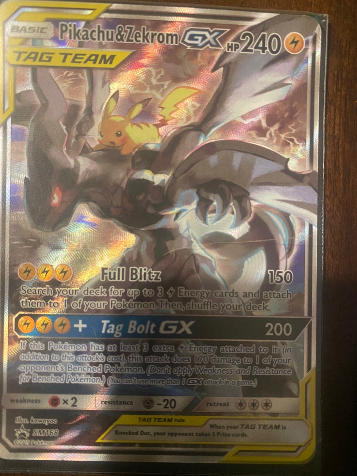 Pikachu and Zekron GX Tag Team Rare Pokemon Card. Holo Promo