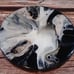 Ceramic coasters have high gloss resin, 4 piece black, cream, and silver