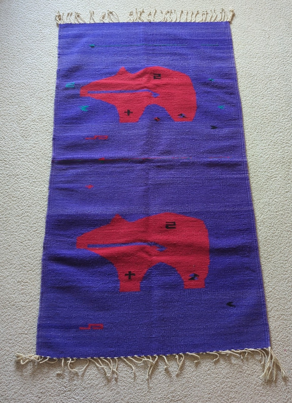 Purple and red Zapotec wool bear blanket rug from Mexico