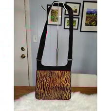 Stuart Weitzman black and tiger stripe leather crossbody messenger bag with smok