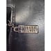 Stuart Weitzman black and tiger stripe leather crossbody messenger bag with smok