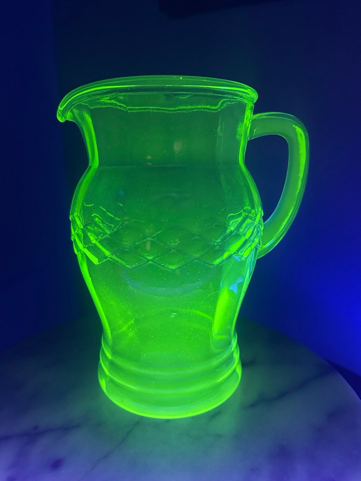 Green Vaseline depression glass pitcher