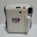 Fujifilm Cheki instax mini 26 Lens 60mm Focus Range 0.5m ~ infinity.