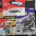 Lot of 13 Johnny Lightning Die Cast Cars 1:64 Scale Some Damaged Packages