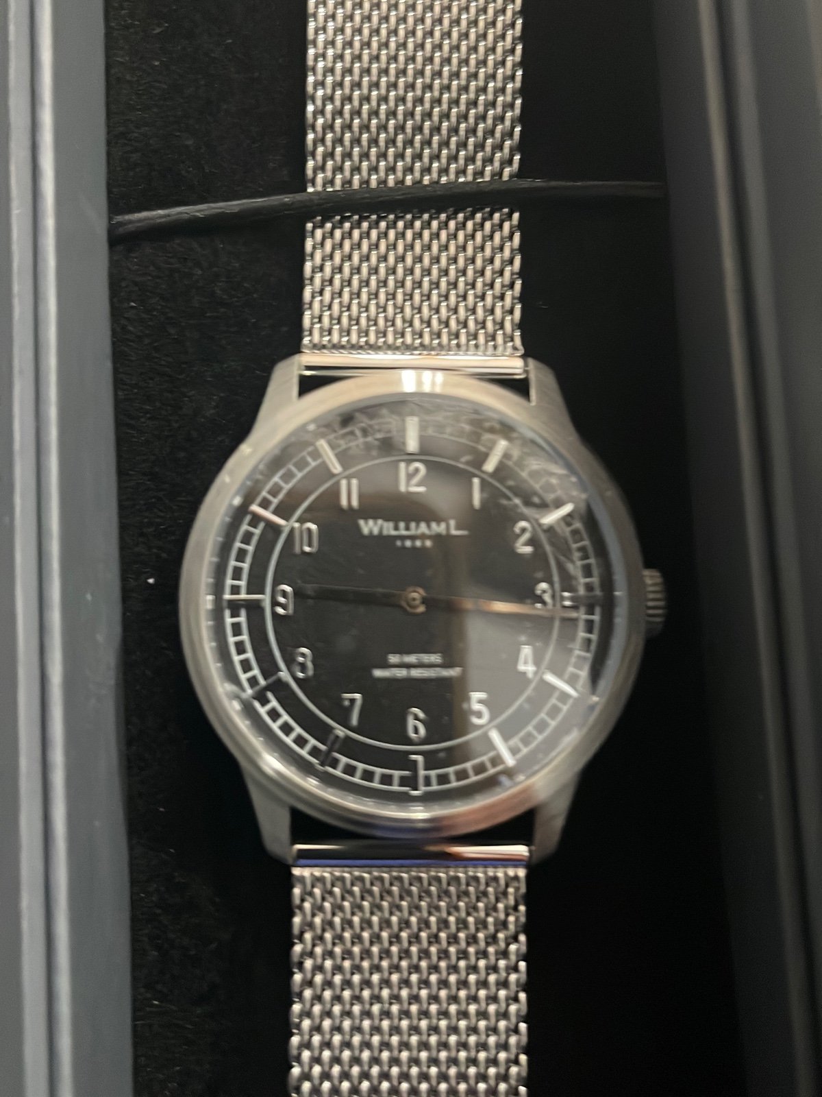 William L. Watch