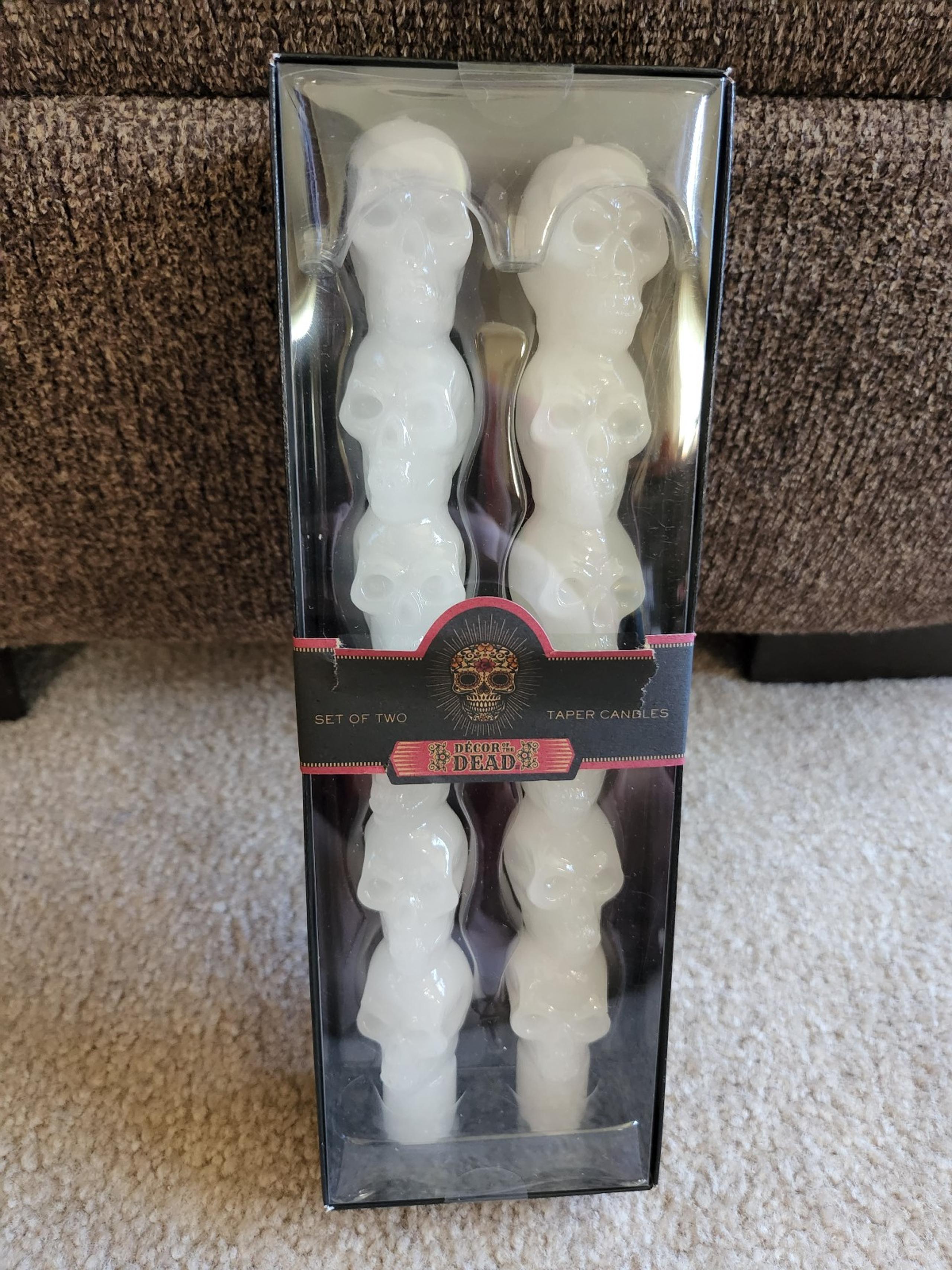 Halloween taper candles skulls
