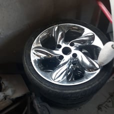 4 lug chrome rims needs tires. I ran the