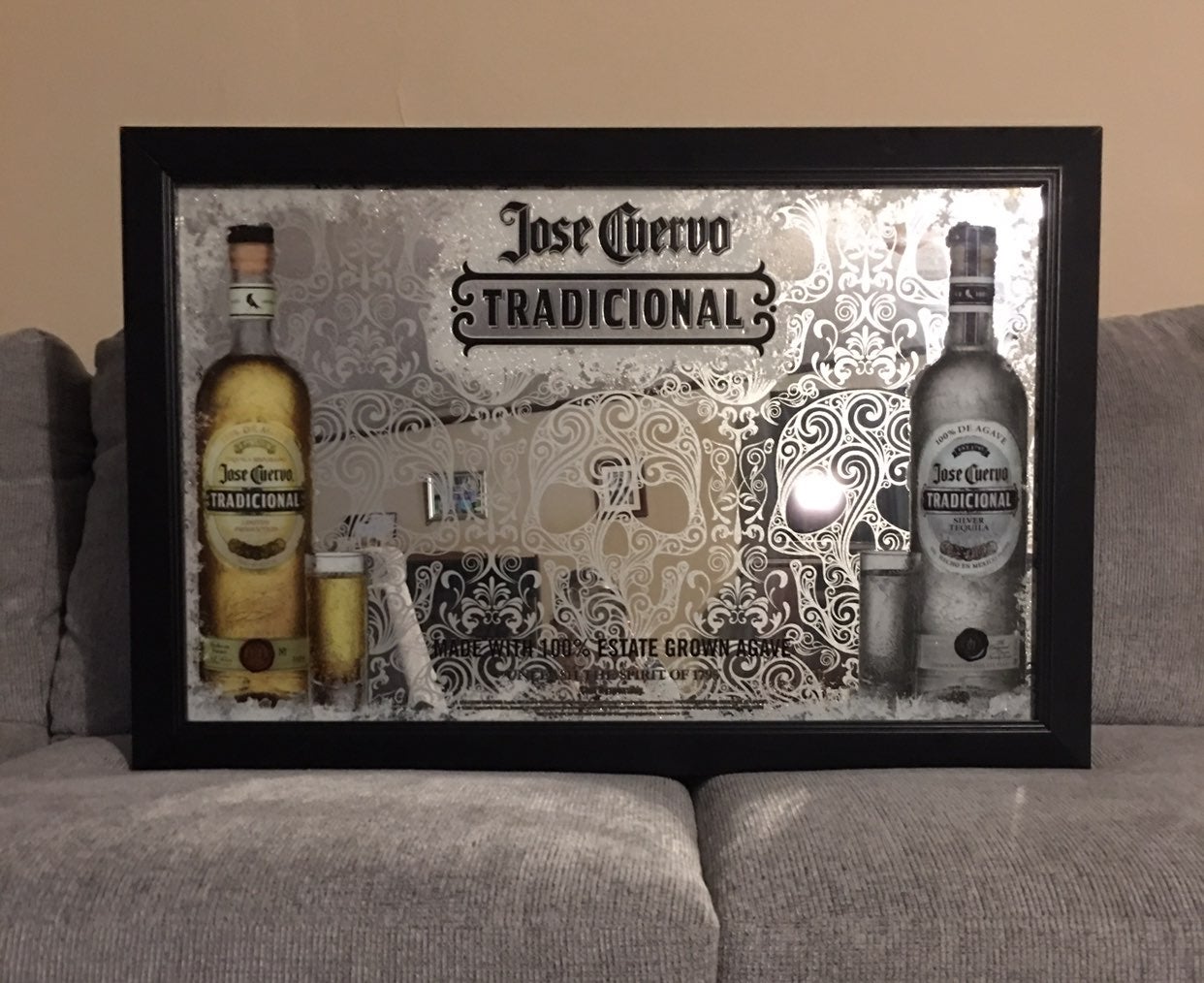 Antique Jose Cuervo etched mirror.