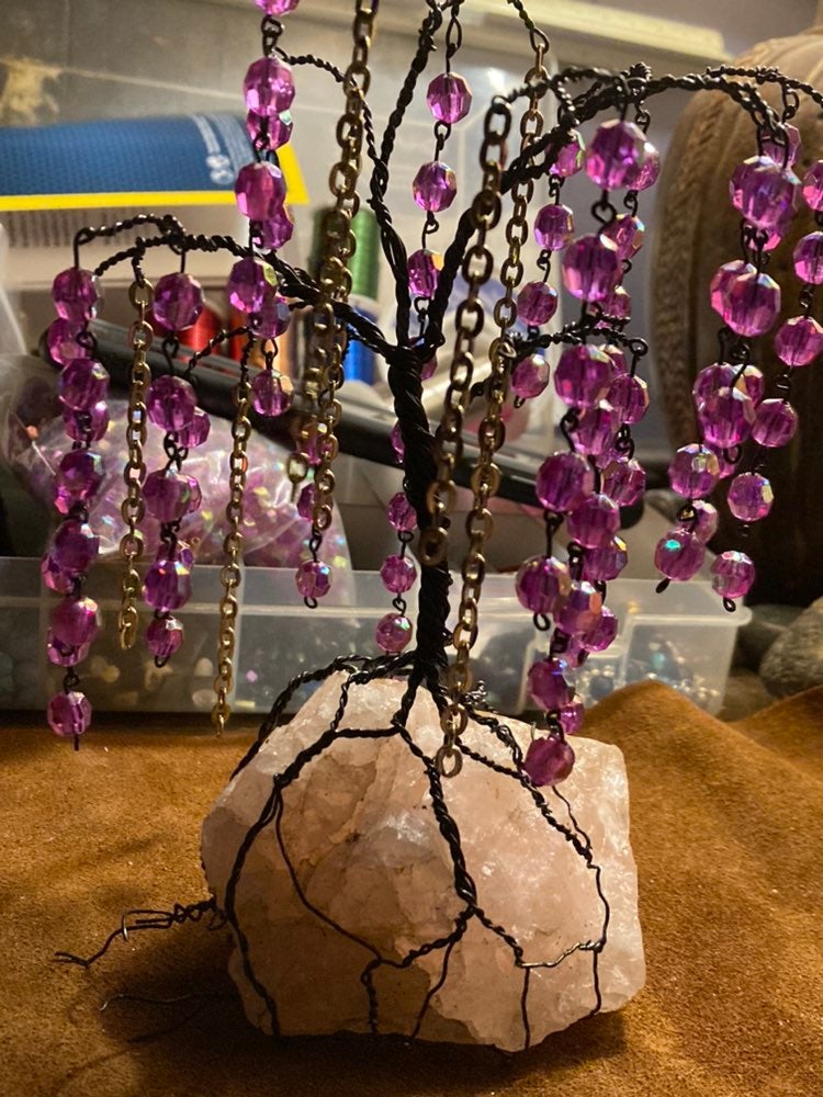 Pink, black and gold willow rooted to a big rose quarts chunk