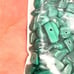 Malachite nugget beads. 204