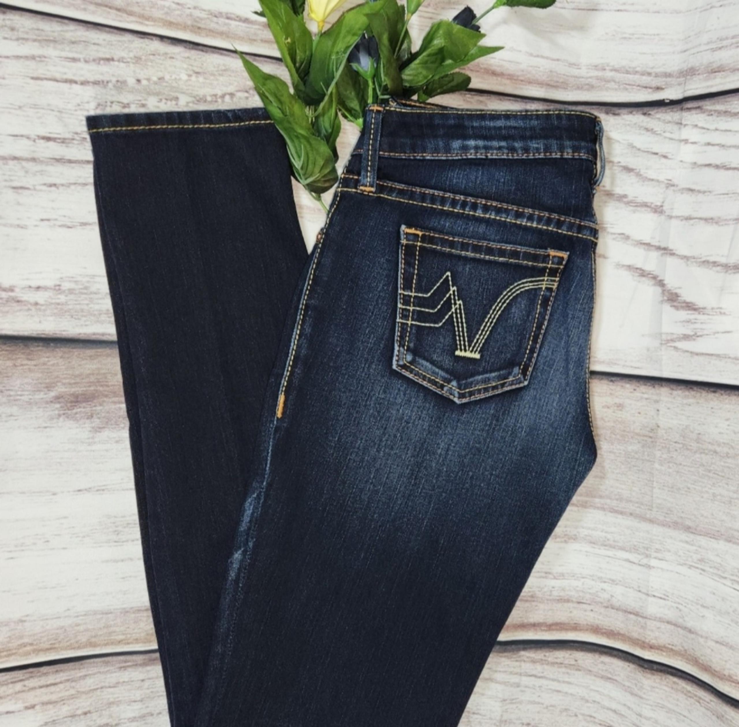 Prvcy dark wash skinny jeans. 29