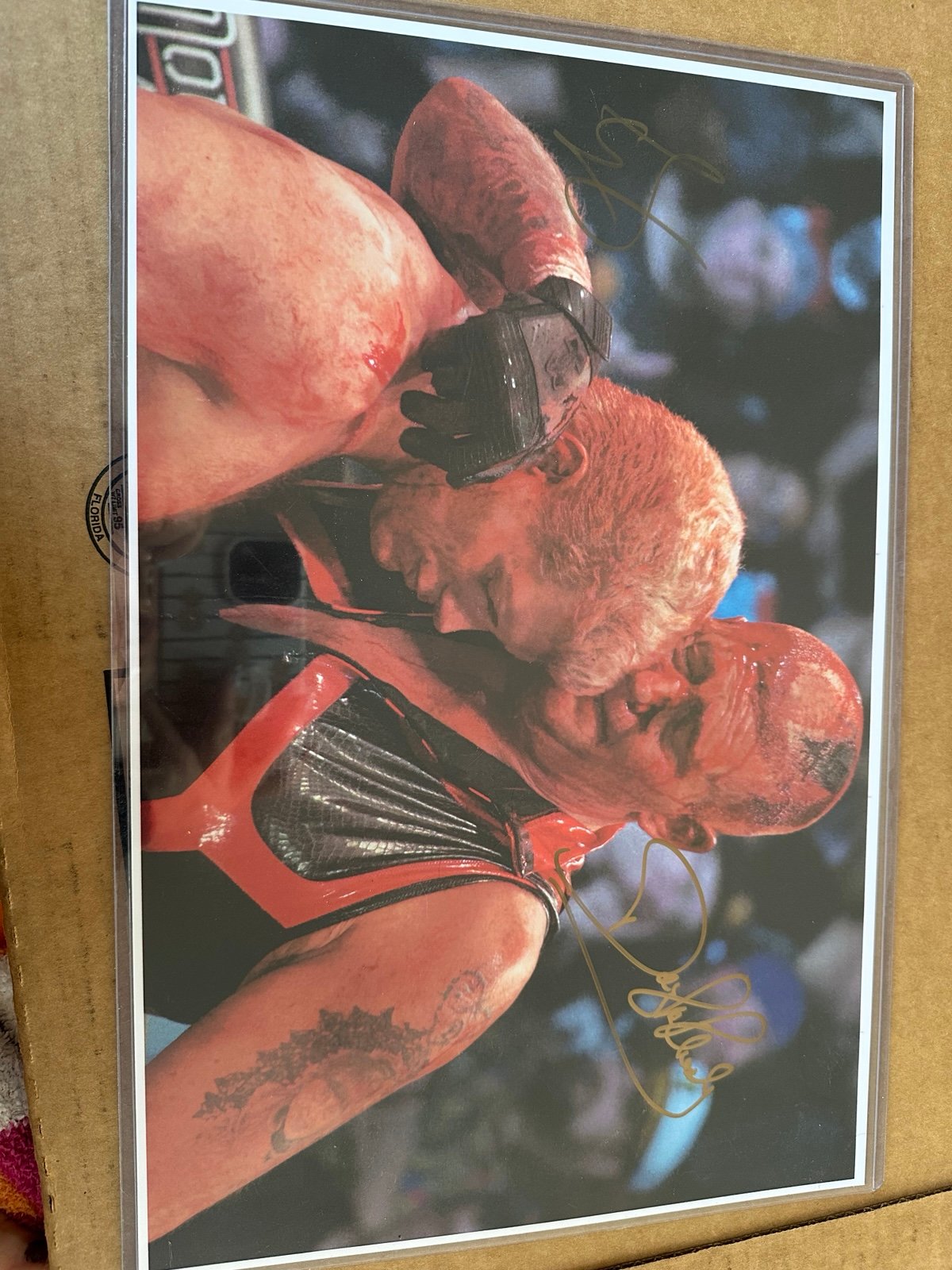 RARE Dual autographed Cody and Dustin Rhodes 11X17