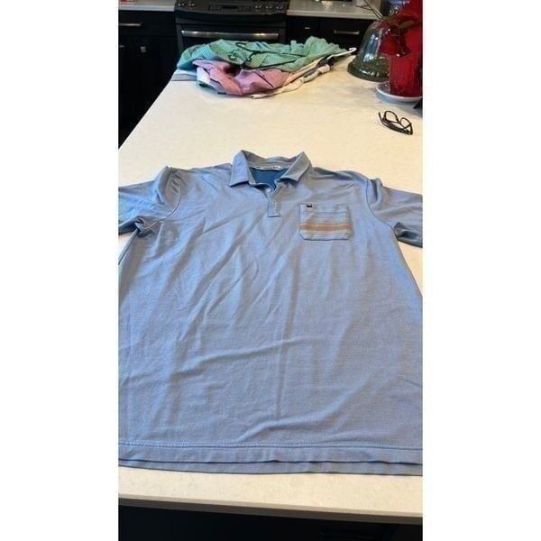 Travis Mathew short sleeved, mens Xlarge, polo nice, nice blue orange.